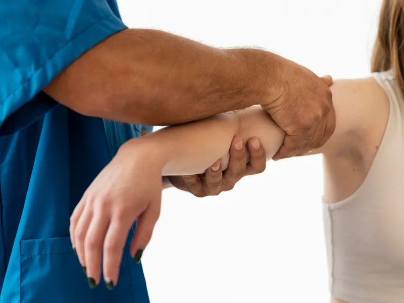 Chiropractic care for elbow pain at Live Well Family Chiropractic in Houston